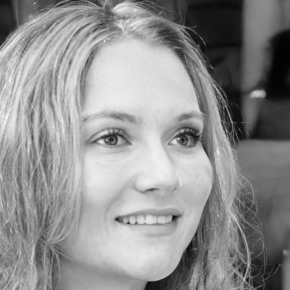 Portrait of Brenna Kallio, distributed systems engineer and lead instructor