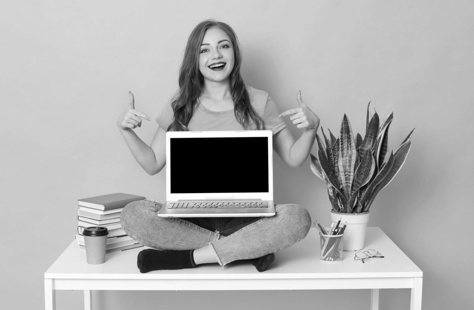 Students collaborating on blockchain project development in modern learning environment